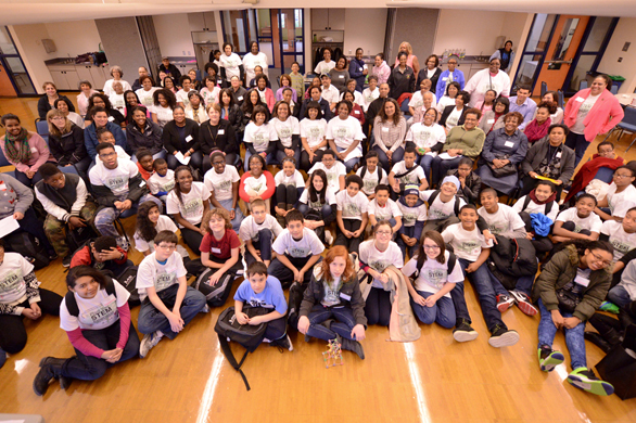 Members of Alpha Kappa Alpha Sorority, Inc. with participants from their Emerging Young Leaders Community Youth Summit.