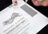 Washington Sues To Block New USPS Ballot Rules Weeks Ahead Of Midterm Elections